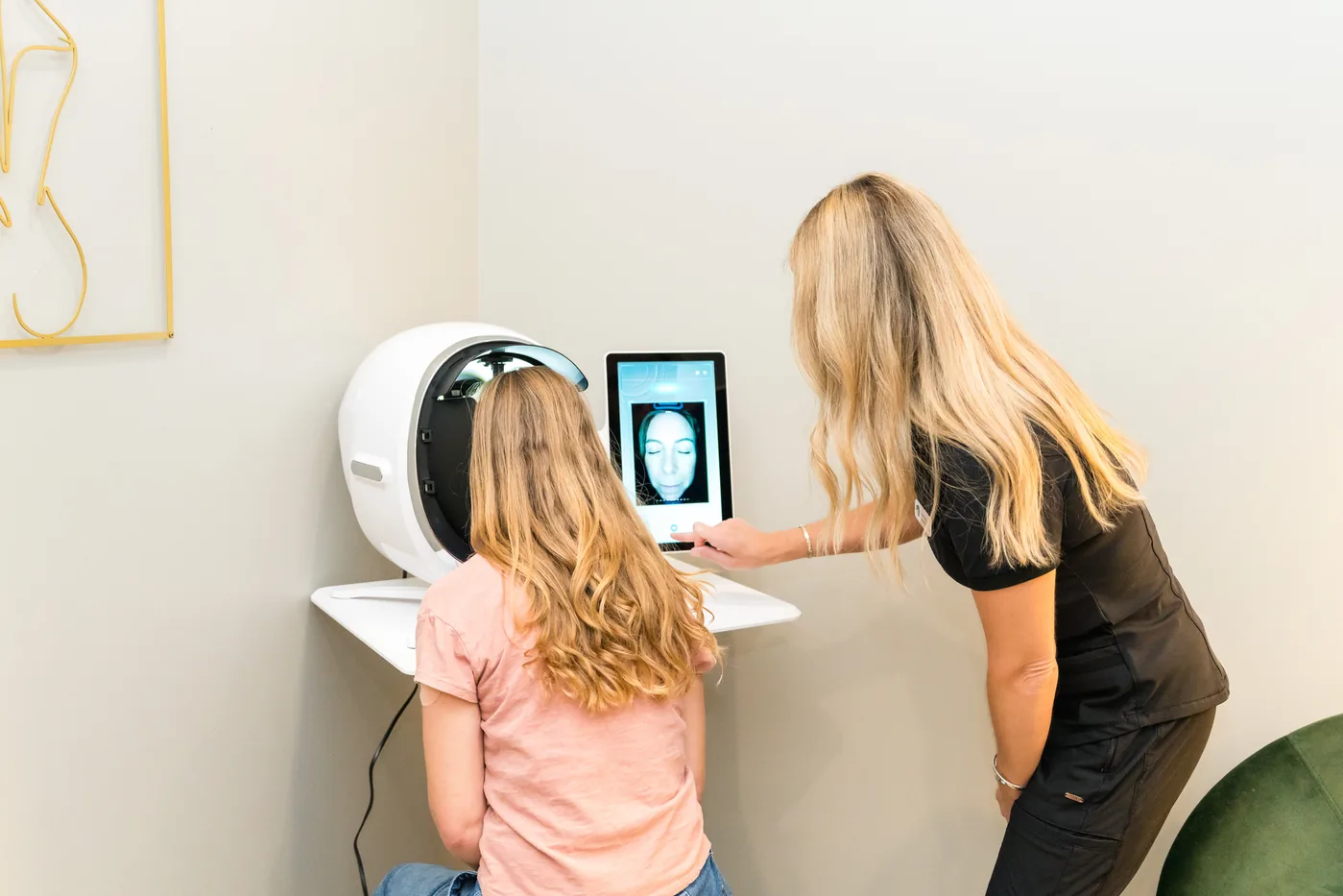 Provider running an AI skin analysis at Banyan & Bamboo in South Austin