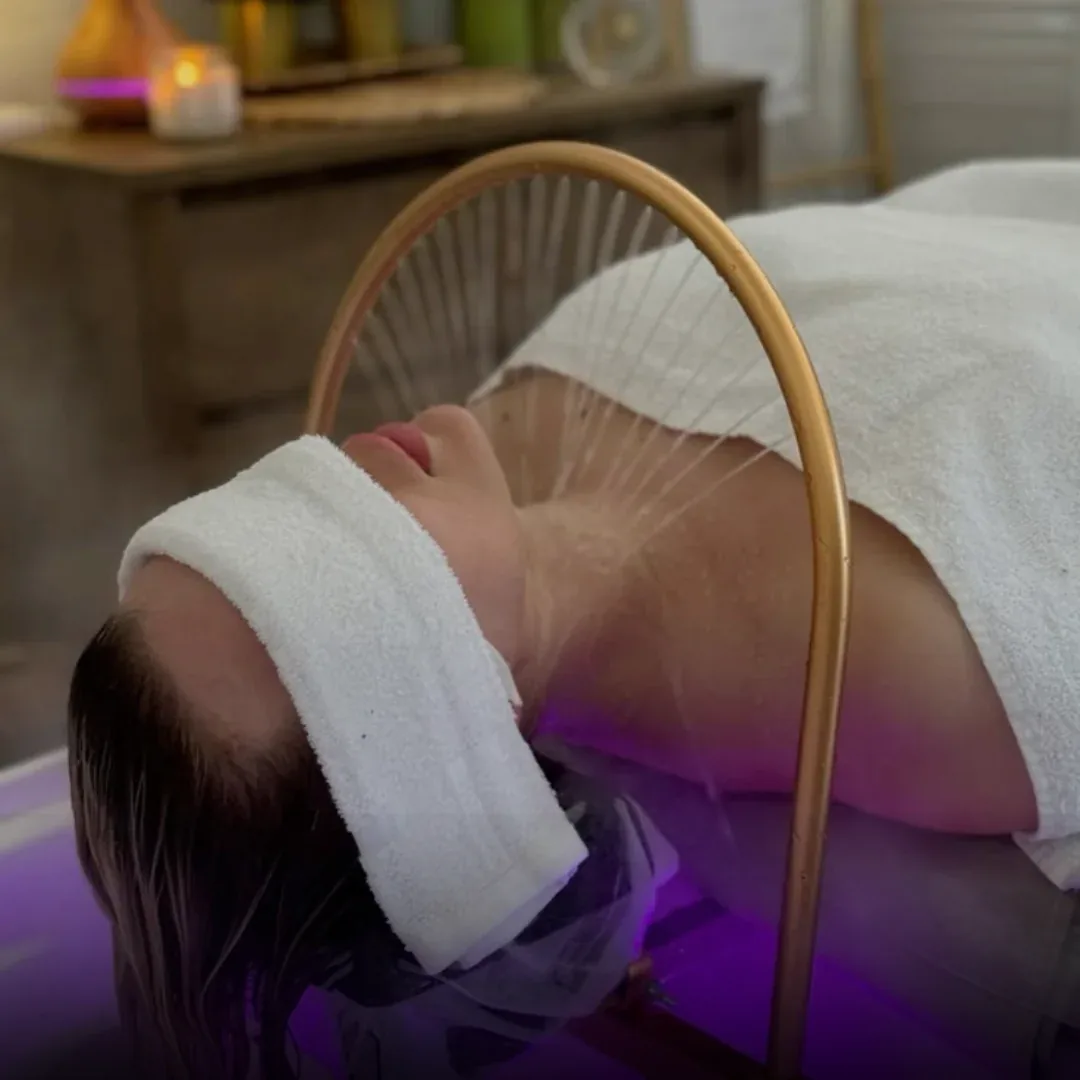 Waterfall rinse during a head spa at Banyan & Bamboo in Austin