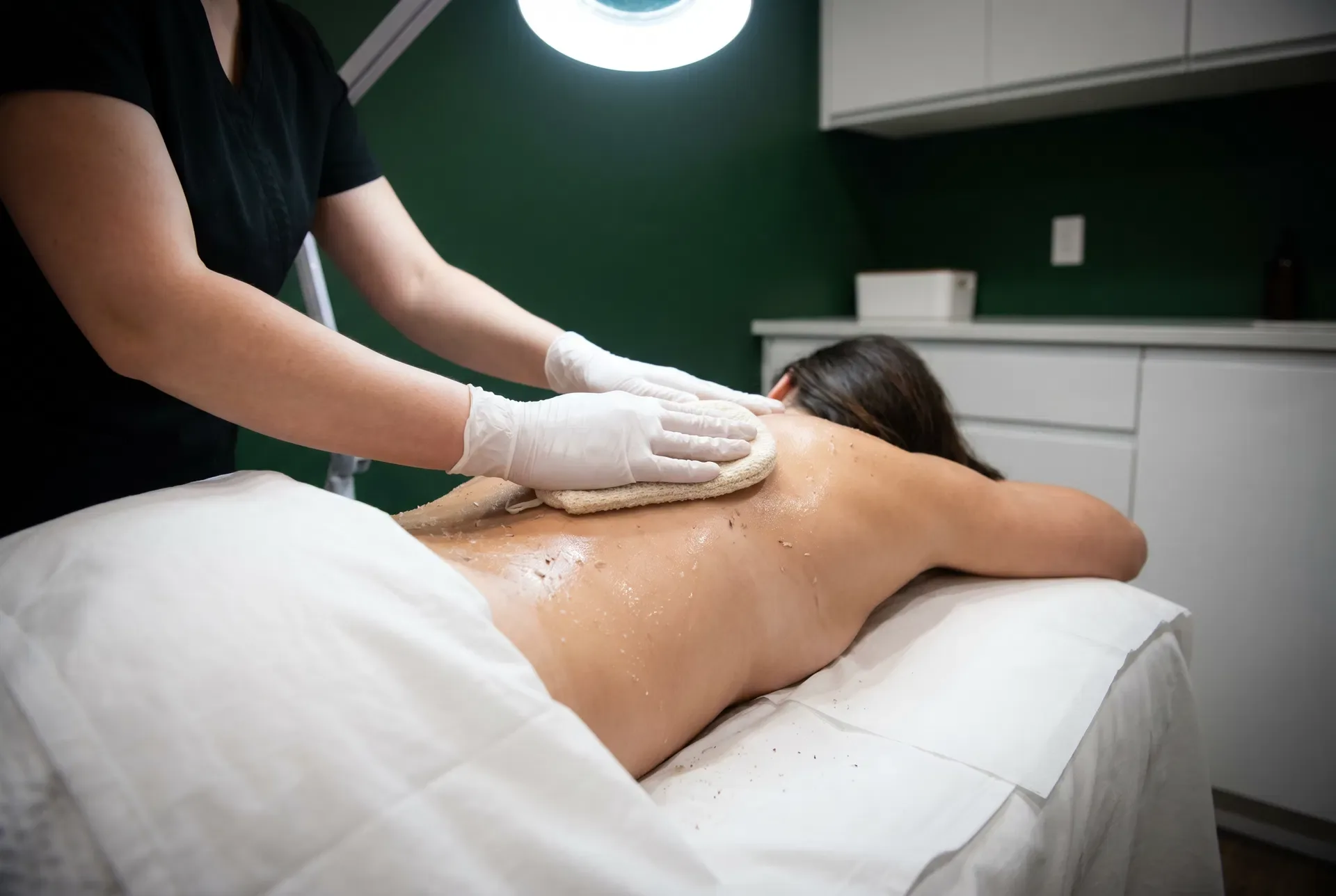 Professional back treatment with oil at Banyan and Bamboo Austin TX