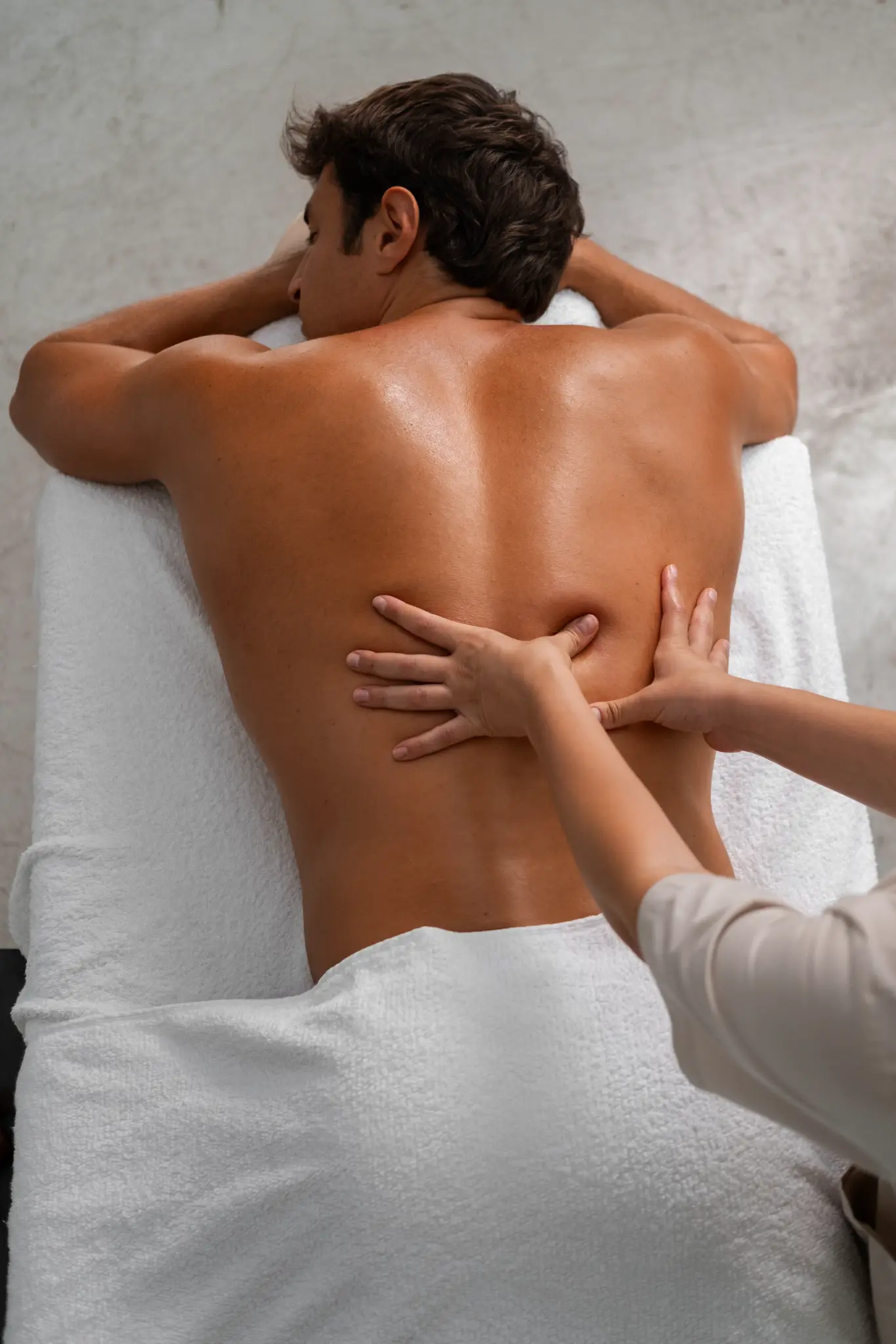 Men's therapeutic deep tissue back massage at Banyan and Bamboo South Lamar Austin TX