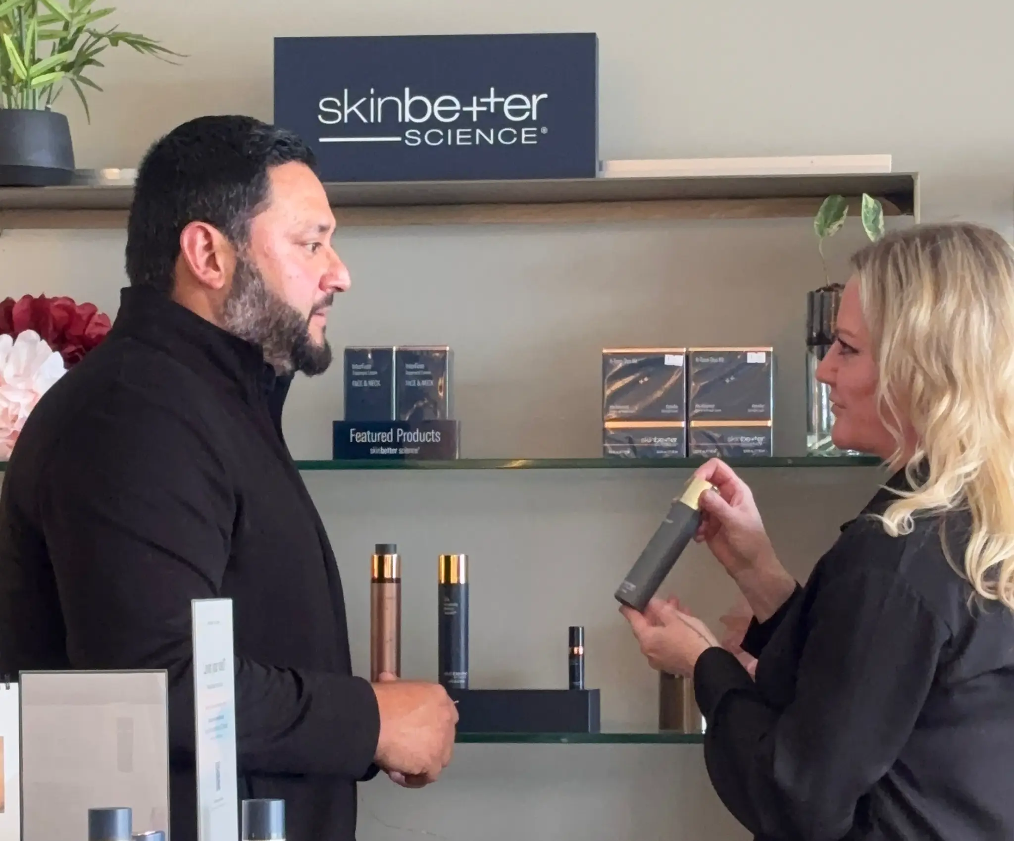 Male client receiving skinbetter science skin consultation at Banyan and Bamboo men's med spa Austin TX