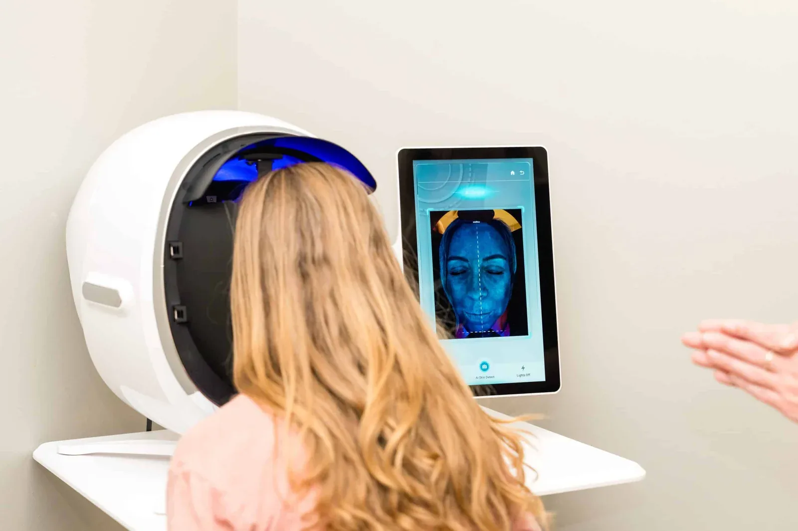 The AI 3D skin scanner at Banyan & Bamboo showing a client's skin map